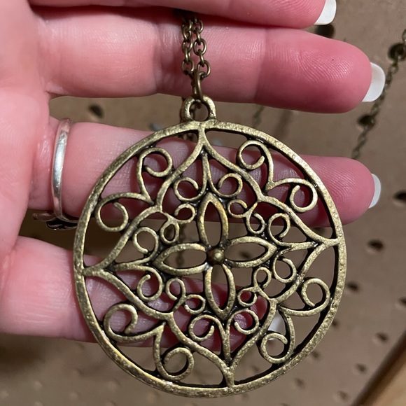 Extra long full copper chain necklace with an open work medallion. - Picture 2 of 4